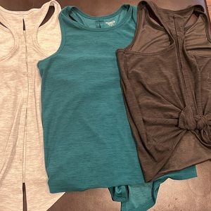 Old Navy spliced back tees size small in various colors sold as 1 bundle.